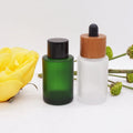 Flat Shoulder Cosmetic Green Bottle Glass Dropper 15 ml 30ml with Dark Wooden Dropper