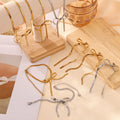 New Trendy 3Pcs 18k Pvd Gold Plated 316L Stainless Steel Tarnish Free Long Tassel Bow Jewelry Set Necklace Earrings Bracelet Set