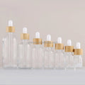 Eco Friendly Real Wood Lid 5 ml 10ml 15 ml 20ml 30ml Skin Care clear Glass Dropper Serum Bottle with Natural Bamboo Cap