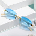 6088 High-End Cross-Border Fashion Sunglasses for Women Versatile Gold UV400 Rimless Oval European American Color Trend Metal