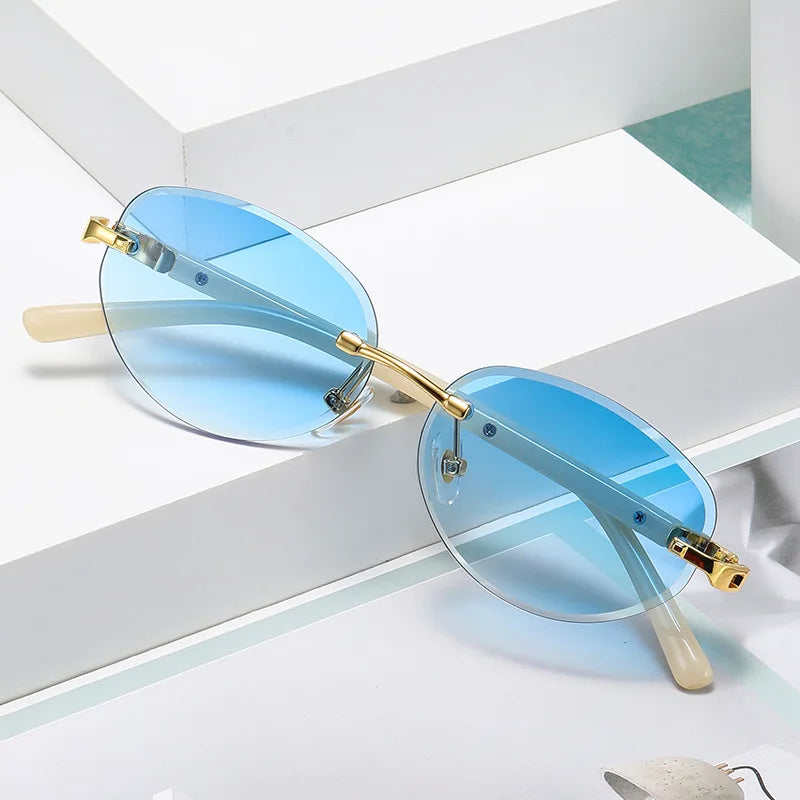 6088 High-End Cross-Border Fashion Sunglasses for Women Versatile Gold UV400 Rimless Oval European American Color Trend Metal