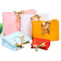 Luxury Fashion Custom Design Logo Printing Eco Friendly Shopping Packaging White Cardboard Paper Bags With Handle and Bow Tie