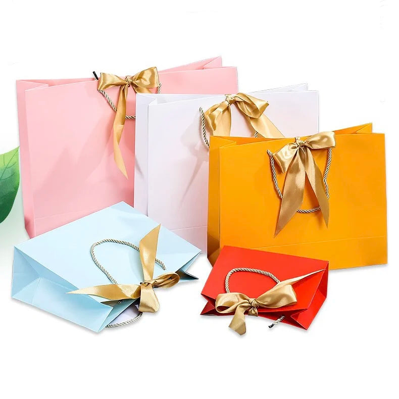 Luxury Fashion Custom Design Logo Printing Eco Friendly Shopping Packaging White Cardboard Paper Bags With Handle and Bow Tie