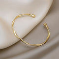 Trendy 18k Gold Plated Ins Cuff Bangle Fashion Minimalist Twisted Cuff Bracelet for Women (KB8557)