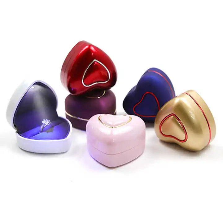 China Wholesale Heart-Shaped Velvet Plastic Ring Box Square Pattern LED Light in Blue Pink Red Wedding Gifts Jewelry Packaging