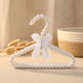 Wholesale Mini White Plastic ABS Pet Hanger Cute Cat Hutch Dog Cloth Perchas for Wardrobe Pearl Mini Pet Hanger for Clothes