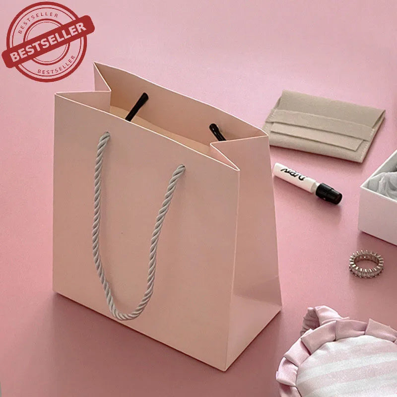Ready to Ship Factory Direct Supply Pink Grey Yellow Craft Paper Jewelry Bag Paper Shopping Bag With Your Own Logo