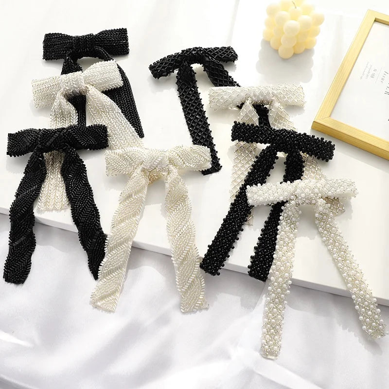 Factory Wholesale New Design Bow Hair Clip Solid Color Pearl Beaded Bow Hairpin Sweet Temperament Girl Ponytail Clips