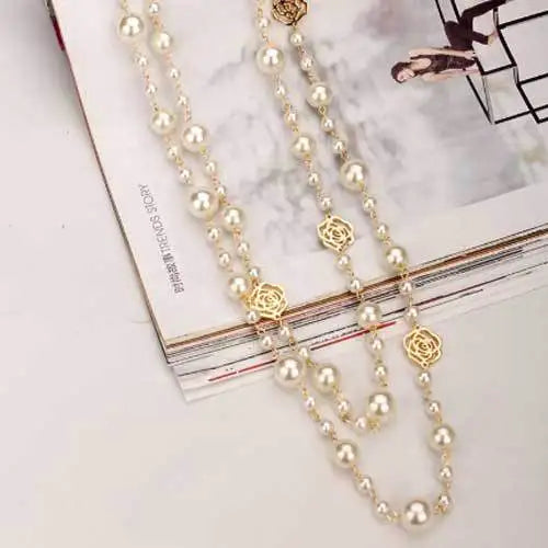 Wholesale High Quality Dainty Small Fragrant Pearl Hollow Out Flower Statement Women Sweater Chain Necklace
