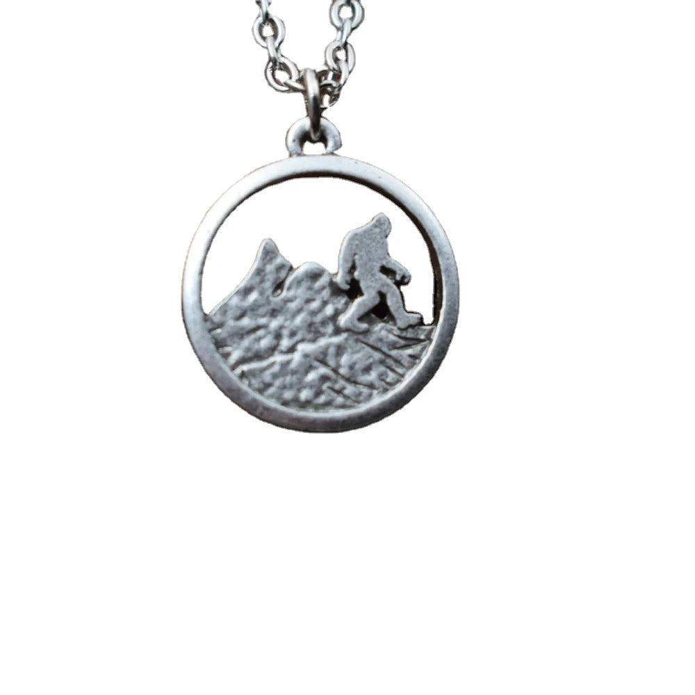 Vintage Wilderness Bigfoot Necklace Running in the Mountain Sasquatch