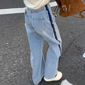 Wholesale 2026 Spring Niche Retro High Waisted Versatile Contrasting Color Patchwork Rough Hem Loose Leg Women's Jeans