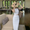 Spring and Autumn Temperament Women's Clothing Set Shoulder Cut Vest Half Body Buttocks Wrapped Long Skirt Set