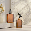 30ml 50ml 100ml Amber Glass Rectangle Essential Oil & Skin Care Serum Dropper Bottle with Custom Logo and Screen Printing