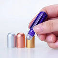 New Design Capsule Shape Perfume Oil Roll on Bottle Cosmetic Purple Amber Rose Red Blue Green Glass Roll on Bottle 5ml