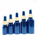 Custom logo 5ml-100ml Electroplating Blue Glass Wood Grain Blue Dropper Bottle Cosmetic Package Container Essential Oil Bottle