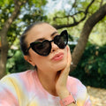 UNOC Women's Fashionable Anti-UV400 Sunglasses with Heart-Shaped Frames in White Red Pink Beige PC CN;ZHE
