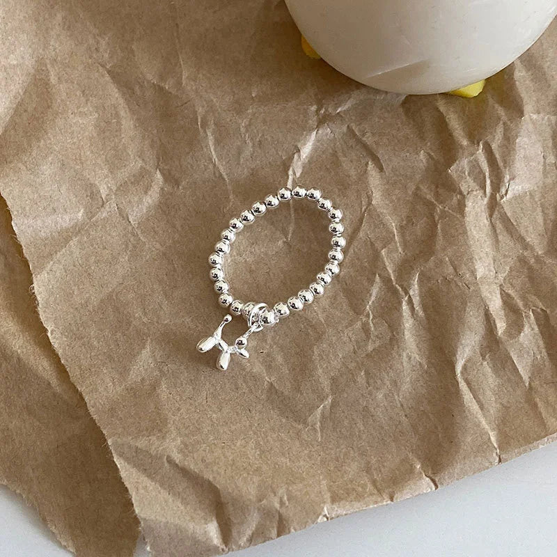 Elastic Sterling Silver Beaded Ring with Balloon Dog Pendant Charm