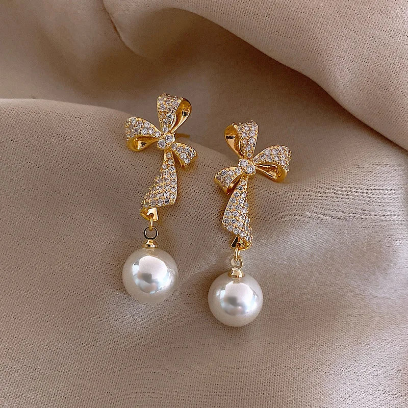 New Style Silver Needle Alloy Bow Pearl Drop Earrings Pearl Dangle Earrings Personality Wholesale Earrings