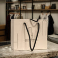 Custom Paper Bags with Your Own logo  Paper Shopping Bags Clothing Women Dresses Packing Bag Printed with Handle Packaging