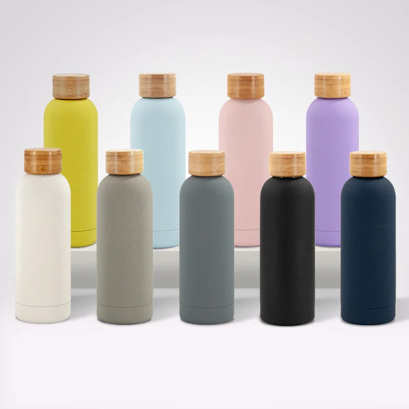Yeway Hot Sale 304 Vacuum Stainless Steel Sports Water Bottle Double Wall Insulated Bottle with Handle and Bamboo Lid