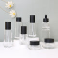 Custom Logo Clear Glass Skincare Bottle Set with Pump Empty Face Cream Lotion Cosmetic Packaging Container