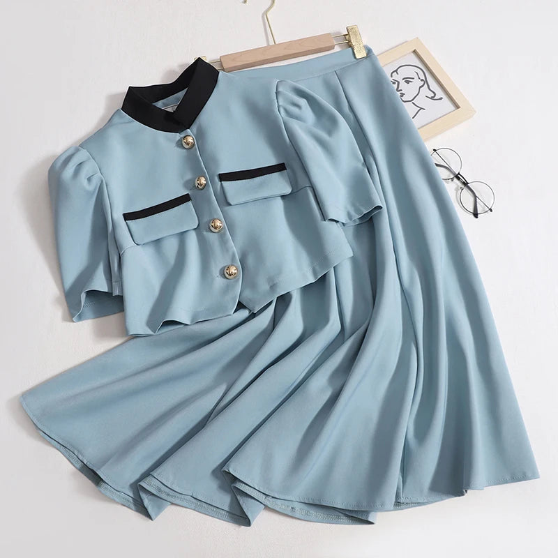 Wholesale 2026 Summer Fashion Temperament Bubble Sleeve Contrast Stand up Neck Shirt High Waist Half Skirt Women's Set