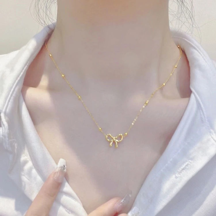 X167 Wholesale Gold Plate Stainless Steel Jewelry Set Non Tarnish Hollow Bow Pendant Clavicle Chain Necklace Bracelet for Women