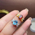 New Design Trendy 925 Sterling Silver Gold Plating Oval Cut Natural Blue Topaz and Garnet Wedding Rings for Women