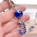 New Alloy Point Drill Lucky Eye Wholesale Key Chain Custom logo Promotional Goods Metal Key Chains
