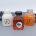 Wholesale big mouth 300ml 400ml 500ml round plastic juice bottles with cap