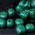 Polished Natural Crystal Malachite Rolling Stone Ornament Feng Shui Style Home Decoration Business Gift for Souvenir Mascot Use
