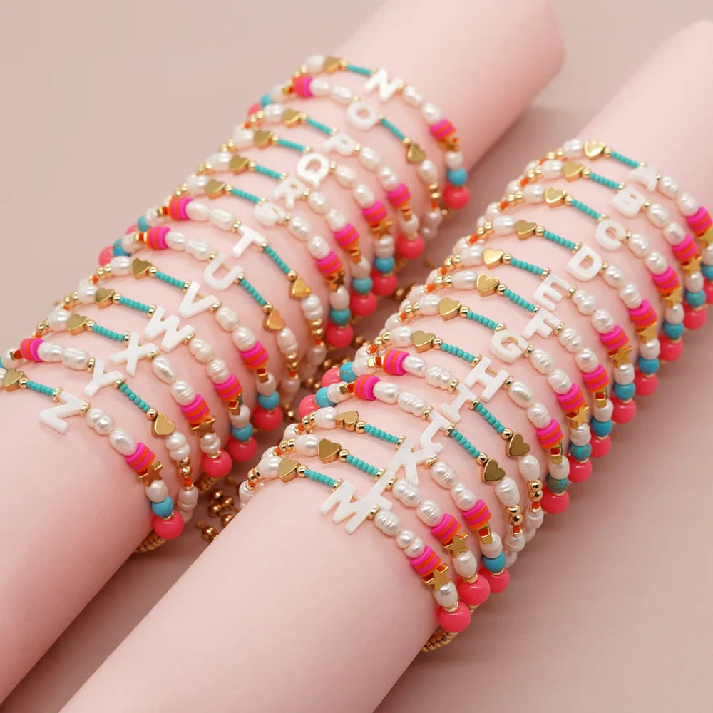 2023 Hot Sale Shell A-Z Initial Letter Seed Bead Bracelet Bohemian Heart Pearl Rope Braided Bracelet for Women