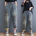 Wholesale Old Stickers Printed Denim Daddy Pants for Women in Autumn 2026 New Large Size Slim Casual 9-point Harlan Jeans