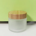 Popular 200g Frosted Glass Jars with Bamboo Lid for Cosmetic Bamboo Cosmetic Packaging Frosted Cream Glass Jar Cookie Packaging
