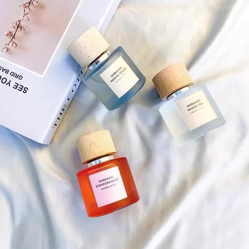 Luxury Cylinder Parfum Botol 30ml Glass Parfum Spray Bottle 50ml Empty Perfume Bottle With Wooden Cap