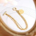 French High-grade Gold Plated Folding Bracelet Queen's Portrait Round Pendant OT Buckle Bracelet