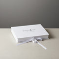 Luxury Custom Logo Recycled Cardboard Packaging Magnetic Box White Ribbon Closure White Flat Foldable Paper Gift Boxes
