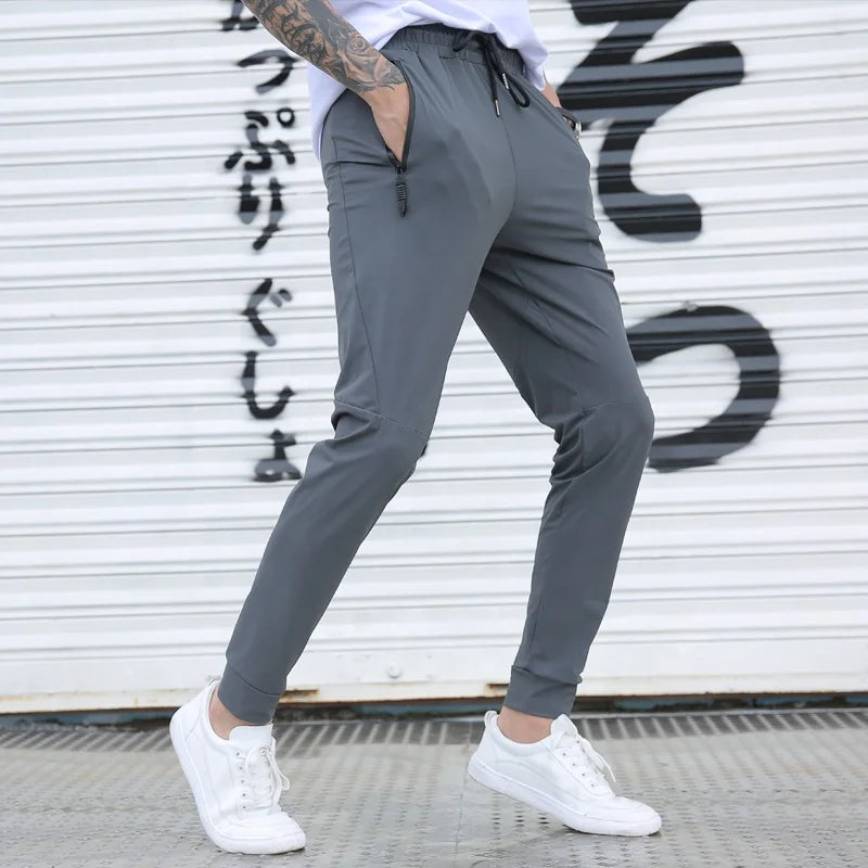 2022 Hot Seller Sport Custom Logo Quick Dry Jogger Pants Men Sweatpants Pants With Zipper