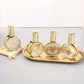 20ml 2023 New Process Luxury Glass Perfume Bottle Gold Hot Stamping Glass Bottle With Gold Sprayer