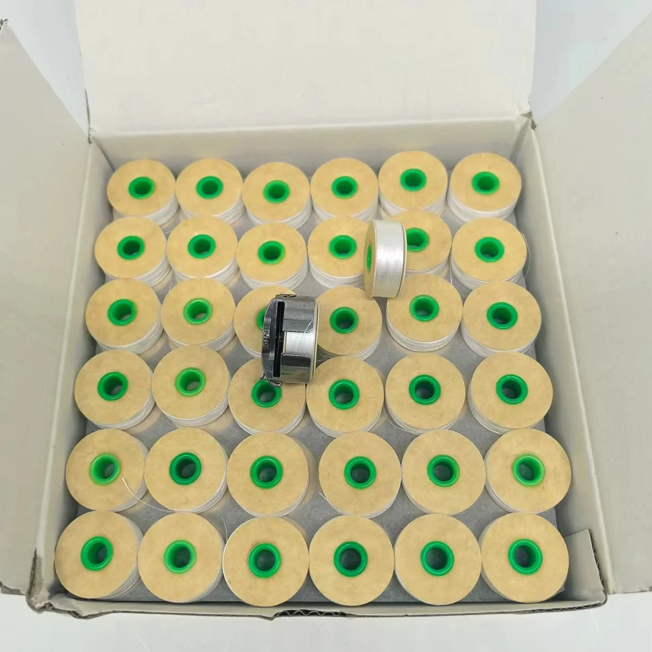 Wholesale Embroidery Pre Wound Bobbins Thread 75D/2 M Type Jumbo Size 100% Polyester Bobbins Thread 144 Bobbins Per Box