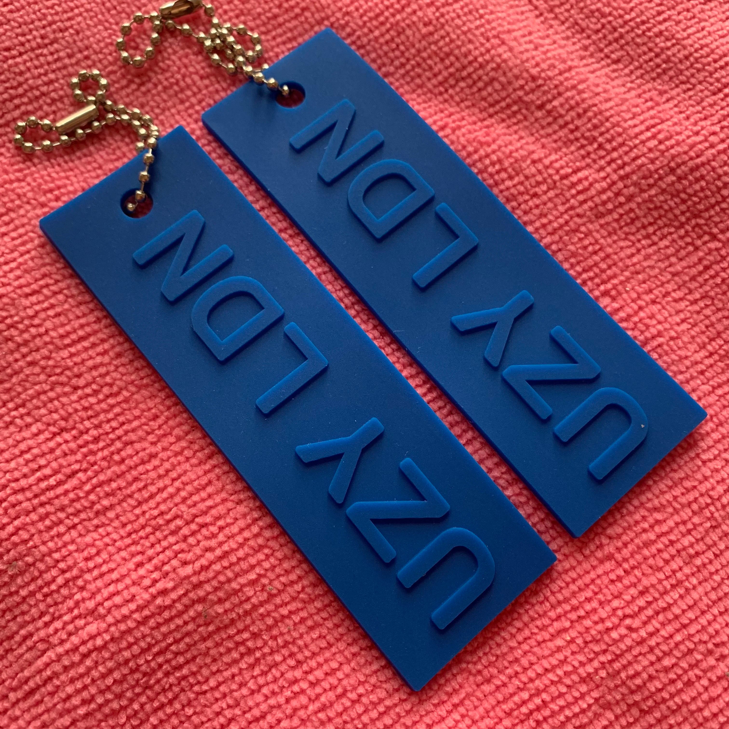 Navy Blue Color Embossed Rubber Swing Tagcustom logo Apparel PVC Rubber hang Tag With Silver Ballchain