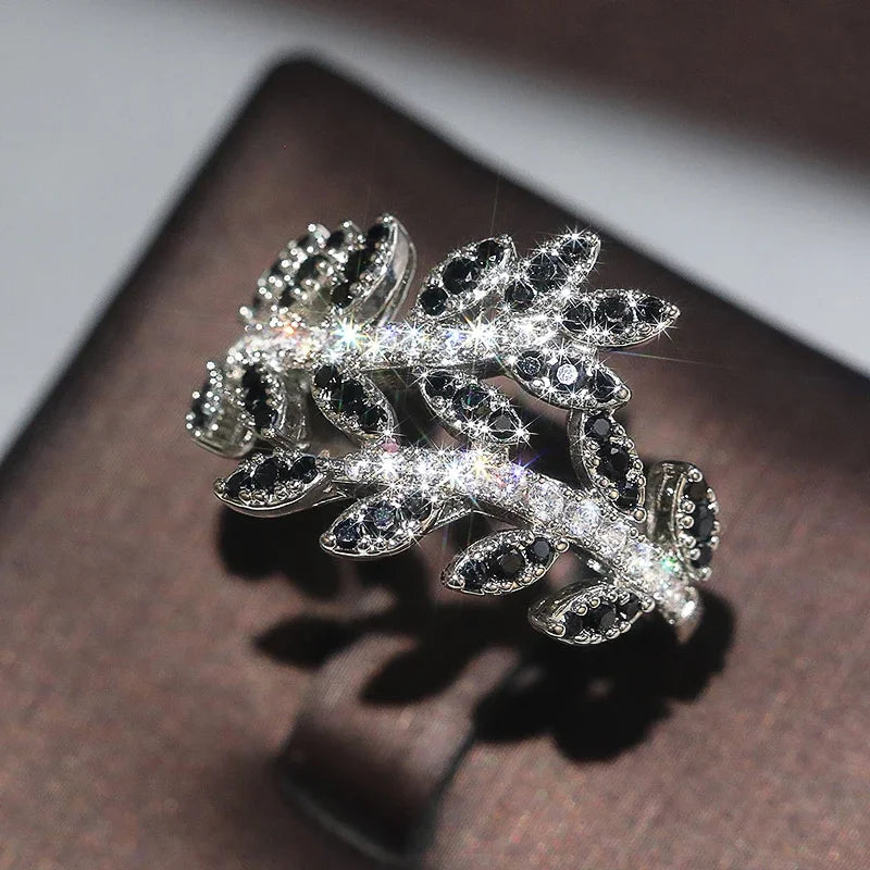Huitan Custom Chic Design Leaves Shaped Sparkling Black/White 3A Zircon Rings for Women Fashion Party Silver Plated Wedding Ring