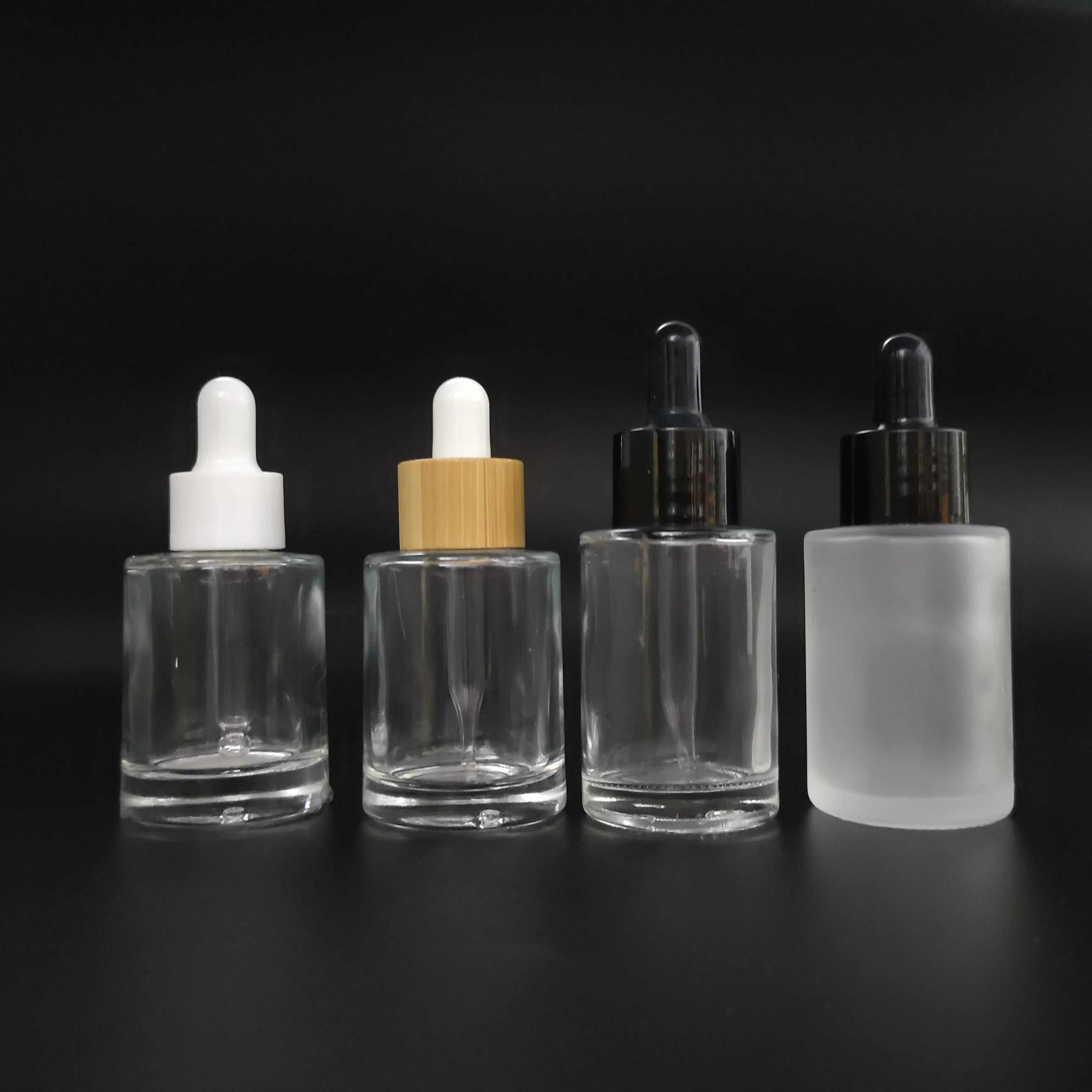 30ml Clear Glass Thick Bottom Serum Bottle Flat Shoulder Essential Oil Bottle with Plastic Dropper Top Cap Wholesale Custom Logo