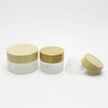 Hot Sale Luxury Frosted 30ml 50ml 60ml 100ml Cosmetics Package Glass Jar for Cream Bodycare with Bamboo Lid