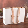 Creatrust Customized Handle Kraft Small Jewelry Survenier Golden Printed Panama Tyvek Grocery Paper Bag