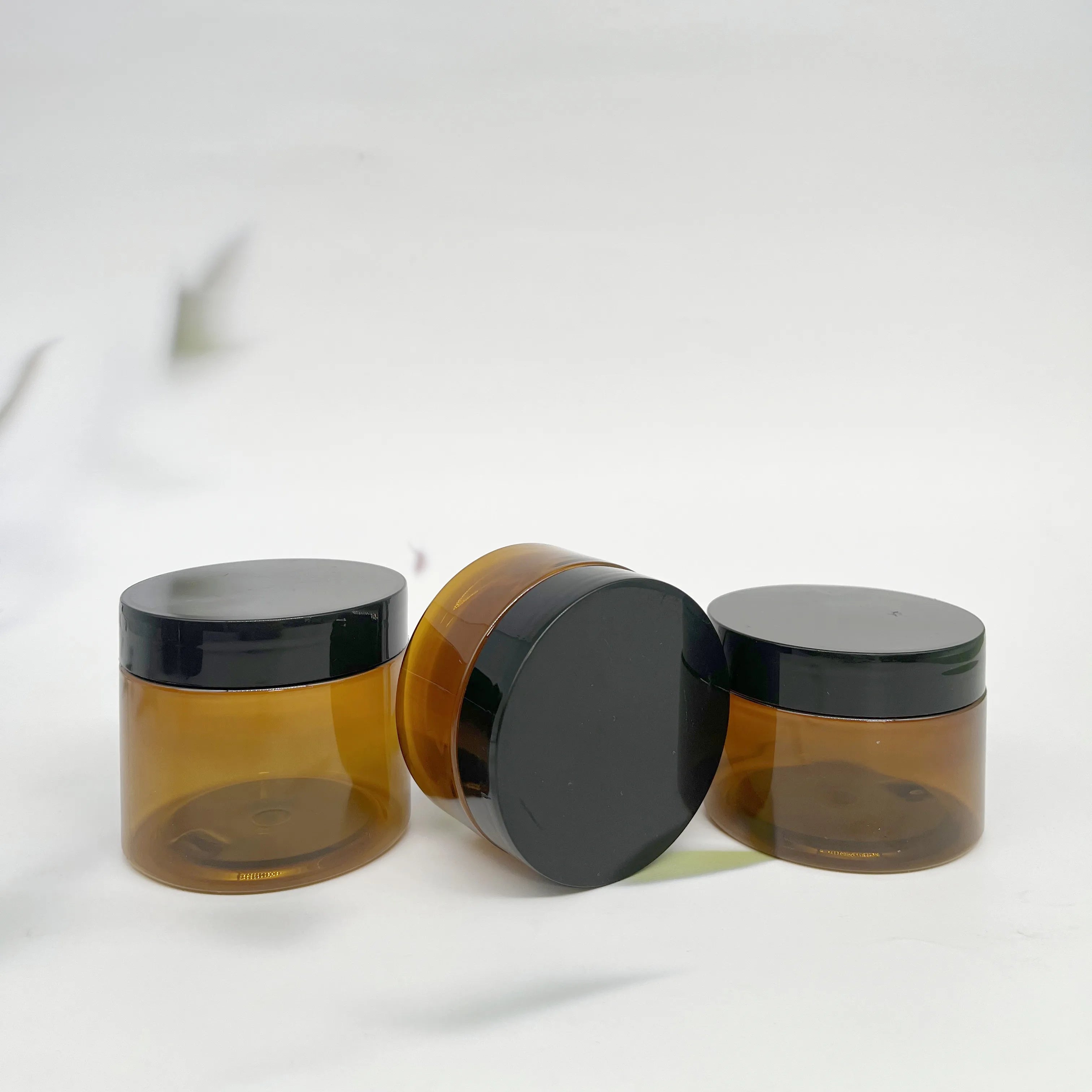30ml 50ml 100ml 150ml 200ml Cosmetic Cream Hair Gel Food Scrub Butter Container Amber PET PCR Plastic Jar with Black Screw Lid