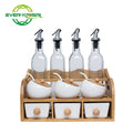 White Ceramic Seasoning Can Set with Bamboo Support Transparent Glass Seasoning Bottle With Three Small Drawers.