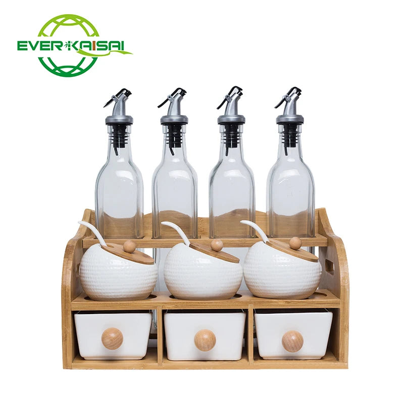 White Ceramic Seasoning Can Set with Bamboo Support Transparent Glass Seasoning Bottle With Three Small Drawers.