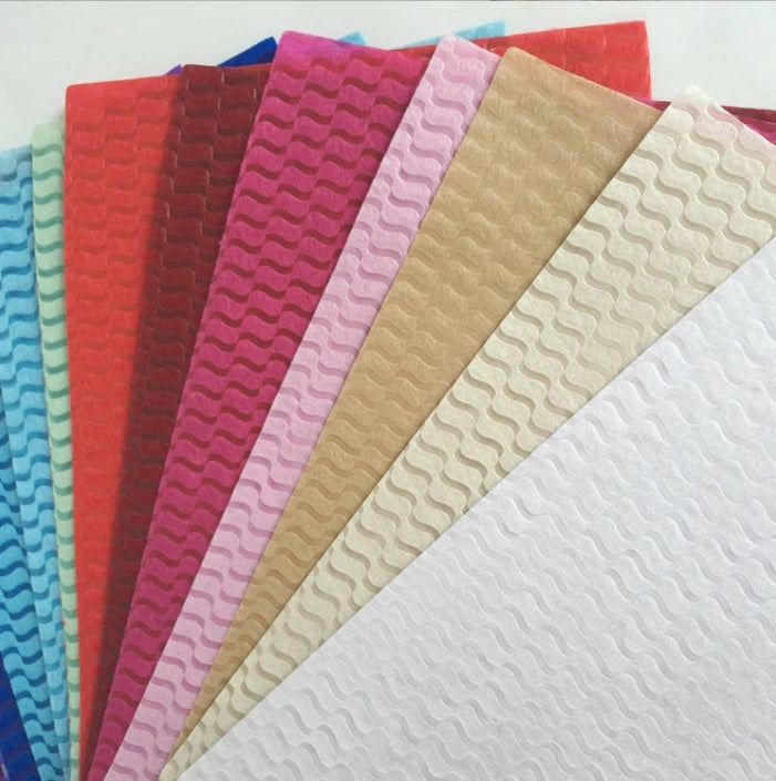 Breathable and Fusible Embossed Non-Woven Fabric Spunbond PP Material with Flower Wrapping and Embossed Waves