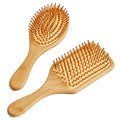 Custom Logo Natural Safety Biodegradable Hairbrush Bamboo Pins Wooden Paddle Oval Bamboo Hair Brush Laser Hair Care Accessories